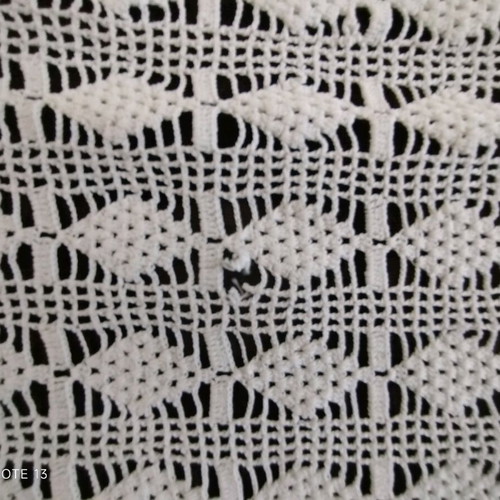 Table linens used, set of two doilies with different designs