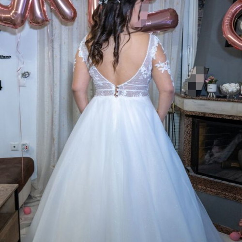 Wedding dress like new with hoop skirt and veil, size L-XL from Atelier Marina Galani