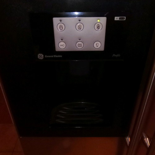 General Electric inox refrigerator used with ice maker and water dispenser