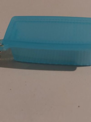 Tupperware collectible keychain like new