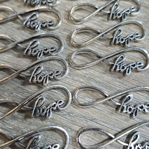 Metal charms like new, pack of 113 pieces