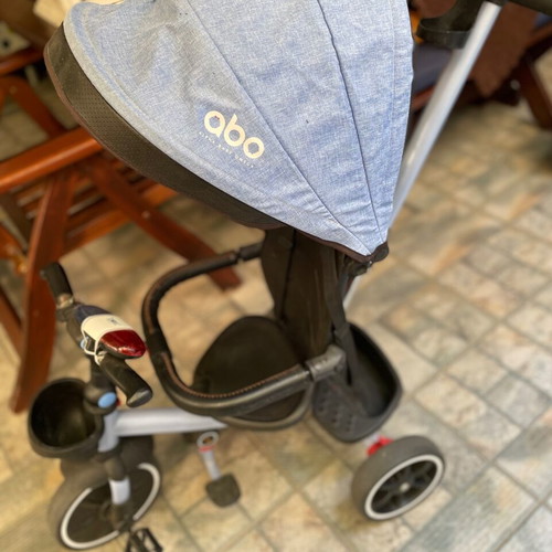ABO tricycle used with adjustable canopy and parent handlebar