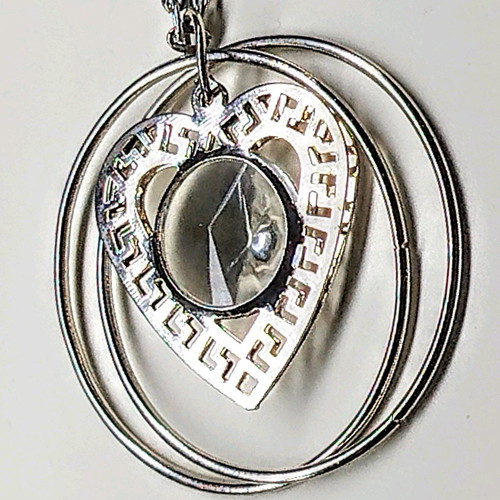 Heart pendant with crystal like new, silver steel