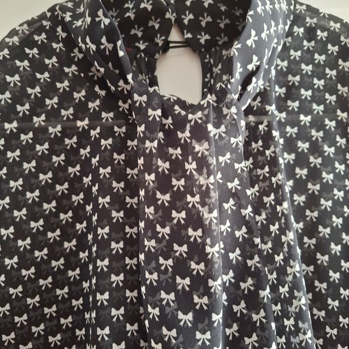 Bellino semi-transparent top with bows size L/XL like new