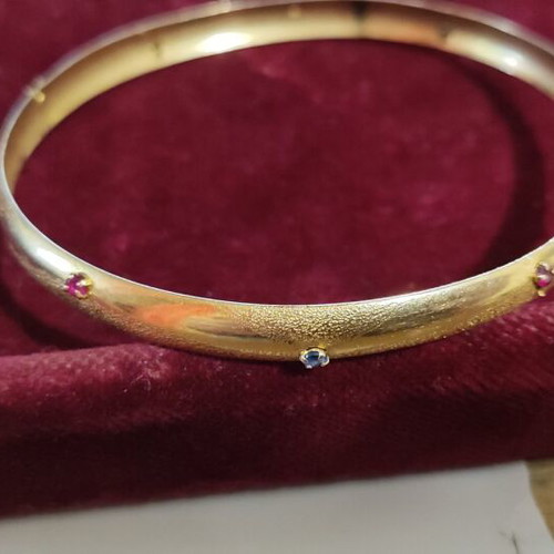 Gold bracelet 9K with sapphires and rubies like new