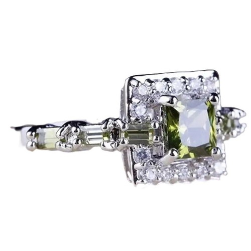 Ring with peridot and white zirconia new, silver plated metal