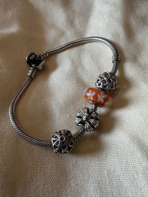 Pandora silver bracelet with 4 genuine charms, new