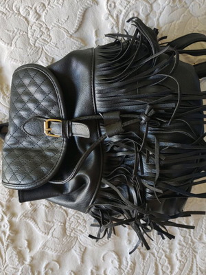 Backpack with fringes like new, black