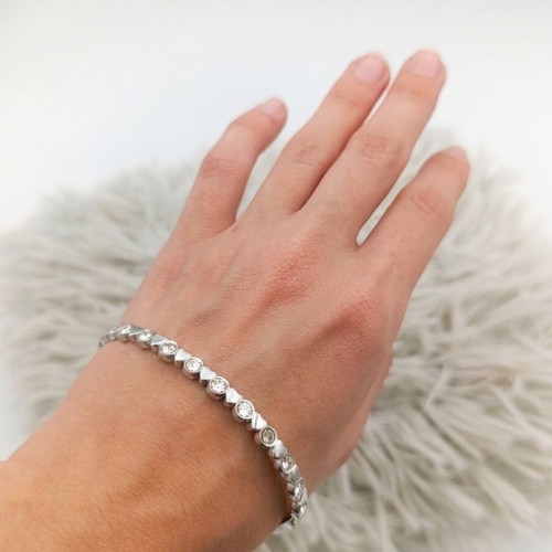 Bracelet new with silver clasp and heart design