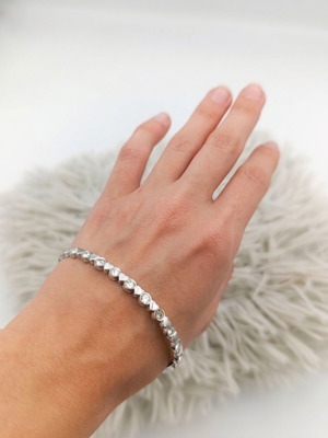 Bracelet new with silver clasp and heart design