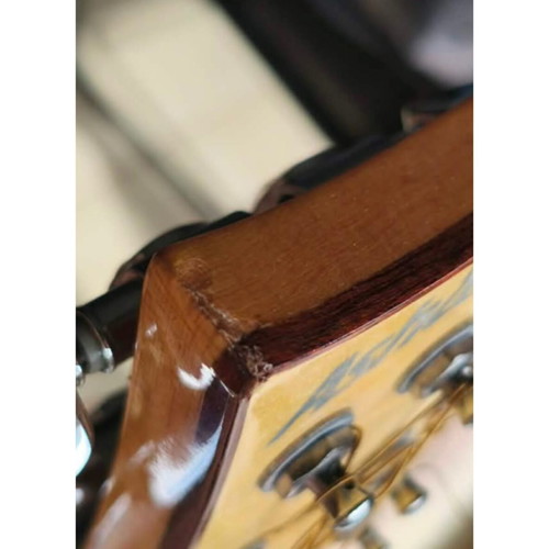 Ashton electroacoustic guitar with built-in tuner and dual outputs
