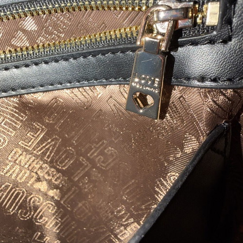 Love Moschino white backpack like new with gold details