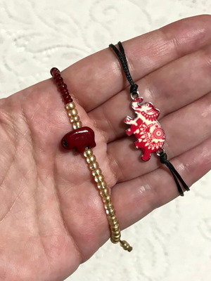 Set of 2 bracelets with red elephants, metal and chalcedony, new