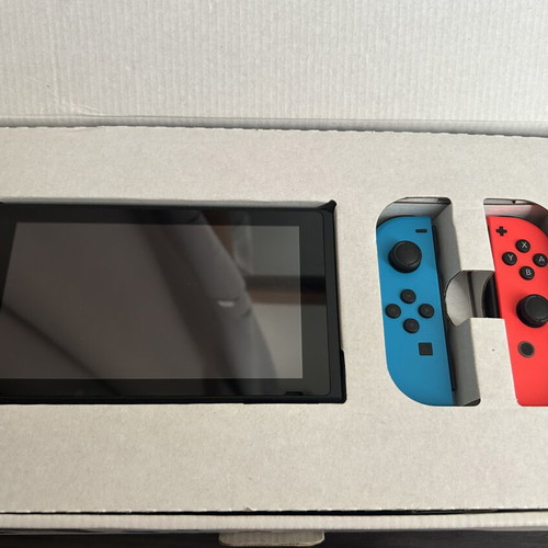 Nintendo Switch console with Joy-Con controllers and dock