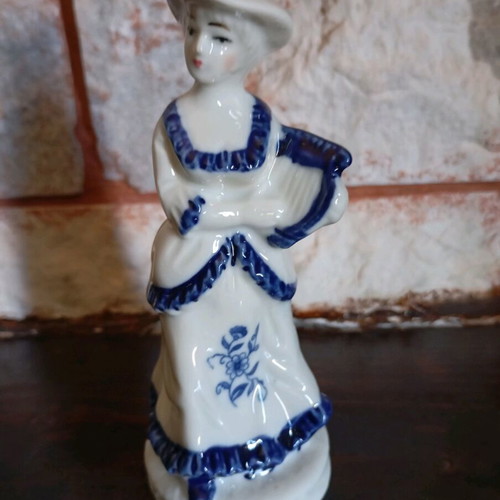 Decorative vintage porcelain figure like new