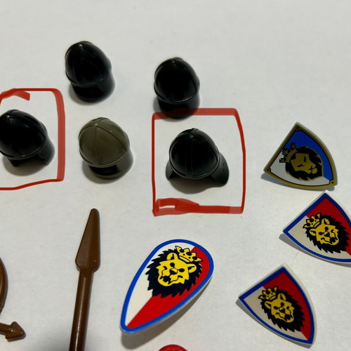 Lego Knights accessories pack used with wear on two helmets