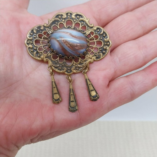 Vintage brass brooch with pendants and cabochon