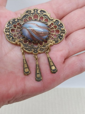 Vintage brass brooch with pendants and cabochon