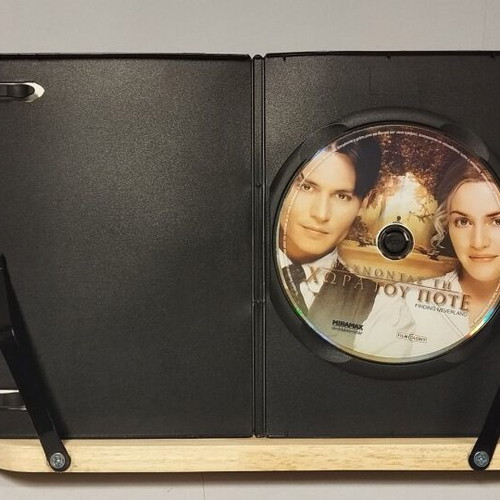 Pack of 4 DVDs used with crime, historical and biographical movies