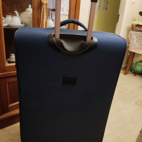Large suitcase like new, blue with wheels