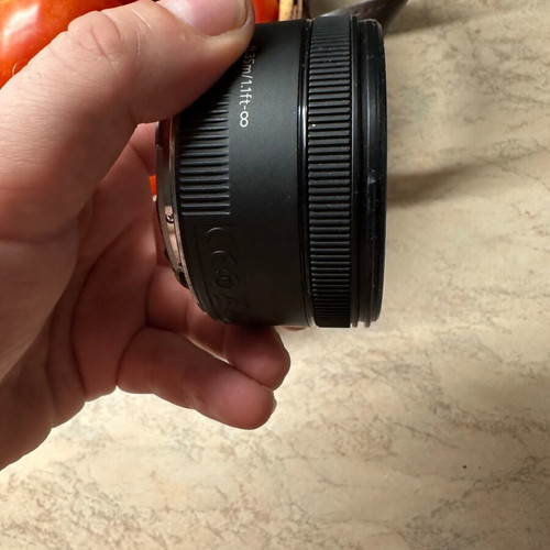 Canon 50mm f1.8 lens with hood