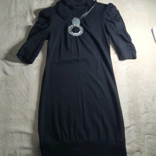 Knitted black dress with short sleeves and turtleneck like new