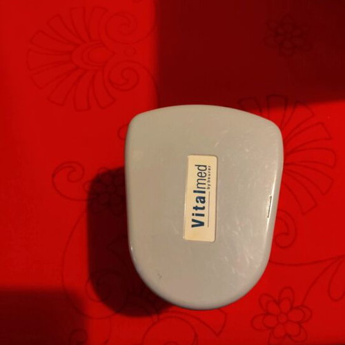 Wrist blood pressure monitor used with broken plastic case