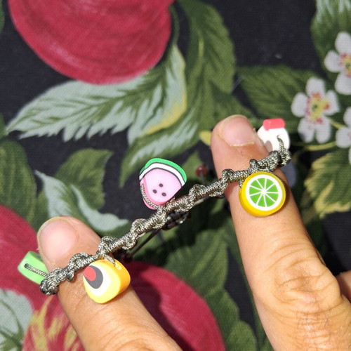 Macrame bracelet with decorative fruit beads
