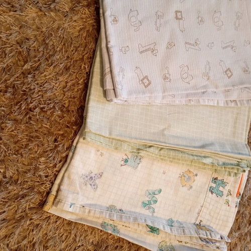 Set of three crib sheets like new Nef Nef