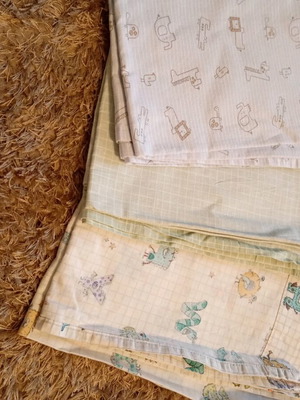Set of three crib sheets like new Nef Nef