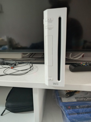 Nintendo Wii console with original controller and accessories