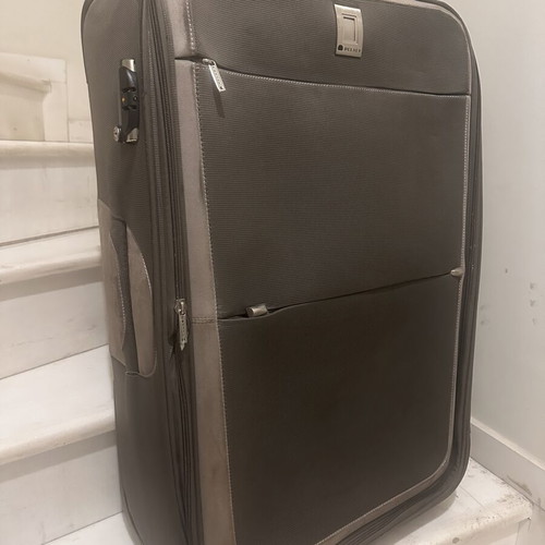 Delsey large travel suitcase like new, fabric with velour details