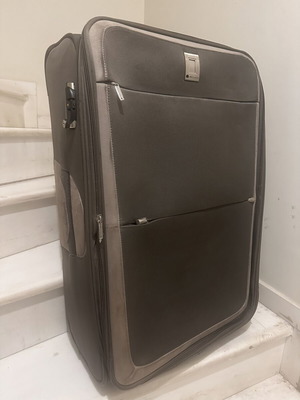 Delsey large travel suitcase like new, fabric with velour details