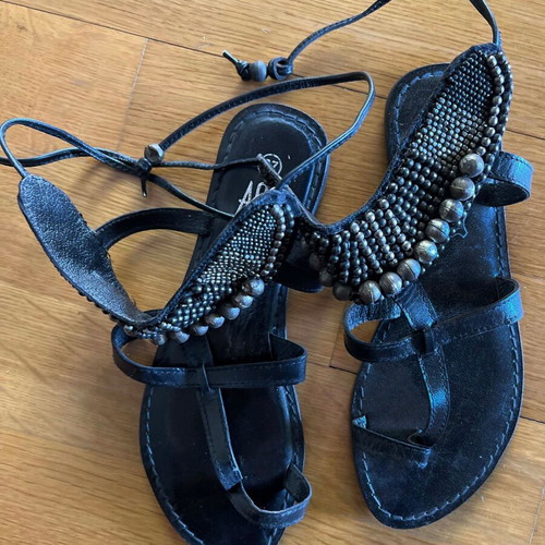 Leather vintage black sandals new, decorated with metal pearls