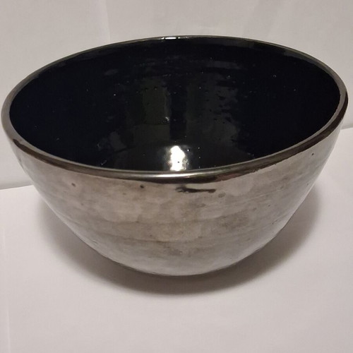 Eleni Vernadaki ADC studio pottery bowl with silver metallic surface