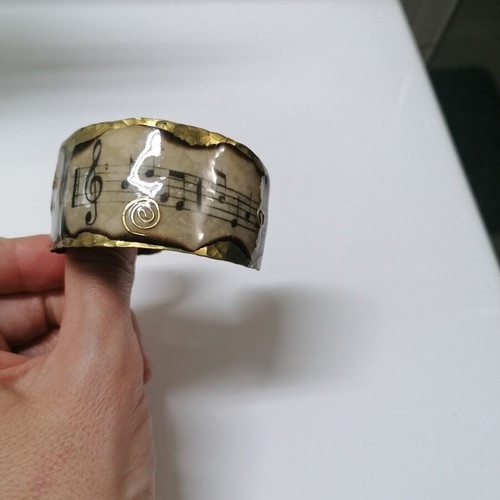 Handmade hammered copper bracelet with musical note design like new