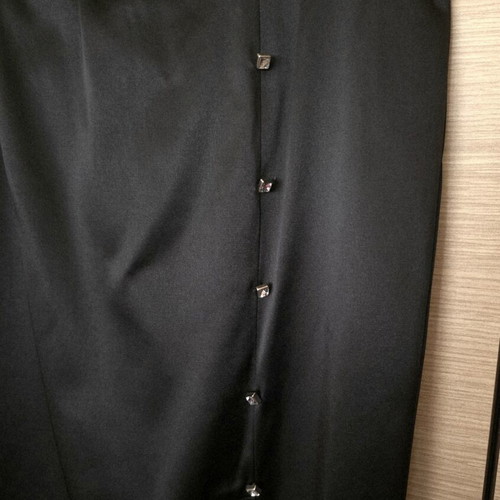 Bill Cost black satin pencil skirt used with decorative closures and slit