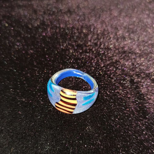 Murano ring like new with blue, orange and black colors and silver leaf