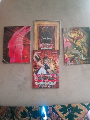 Yugioh official rulebook 4.0 and 3 used playmats Traptrix and Crimson King