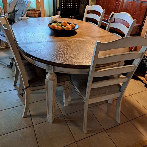 Ashley dining set like new with 6 chairs, round and extendable