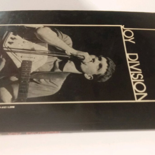 Joy Division book used with lines on cover