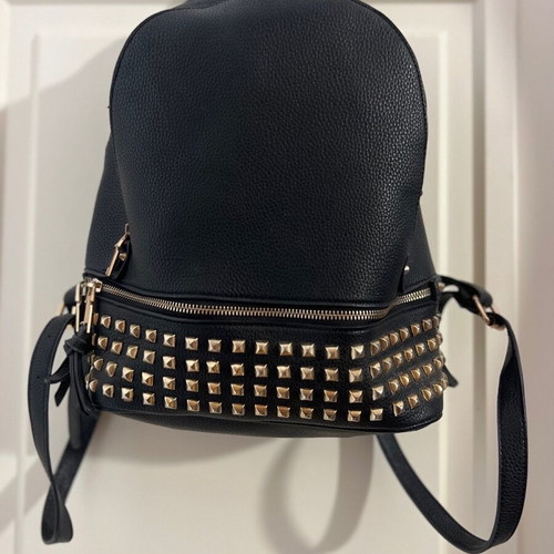 Black backpack used with studs