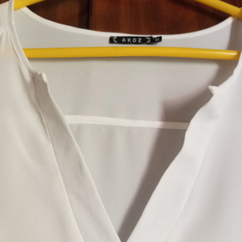 White airy long shirt with V neckline