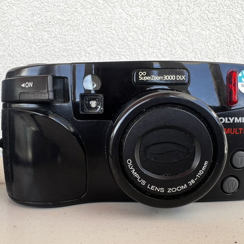Olympus Super Zoom and Nikon Zoom Touch 600 cameras used