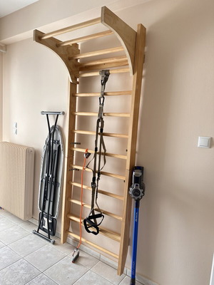 Wooden gym wall bars with pull-up attachment