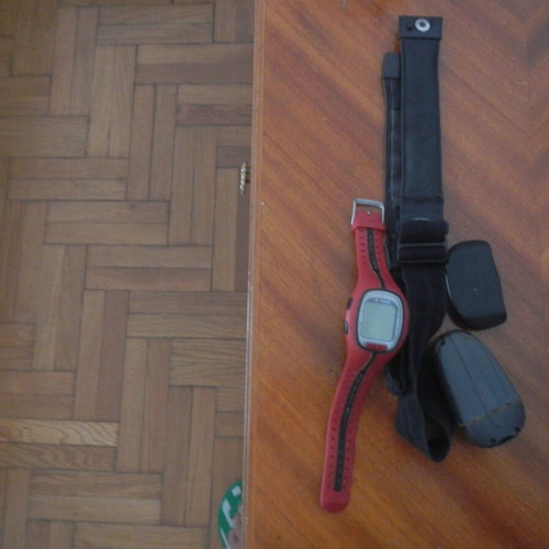 Polar watch with heart rate monitor for calories, distance, and speed tracking