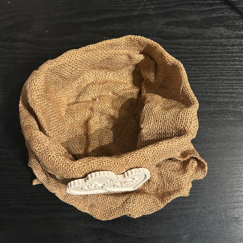 Hard pouch made of burlap with ceramic decoration like new