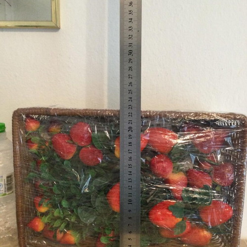 Basket with artificial fruits like new