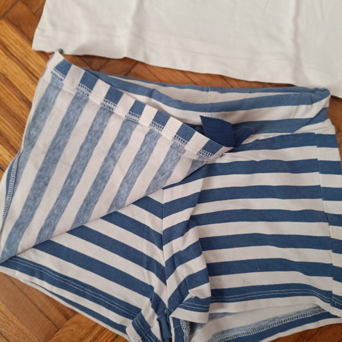 New College girls' set with striped skort and sequin bow top, used, size 6