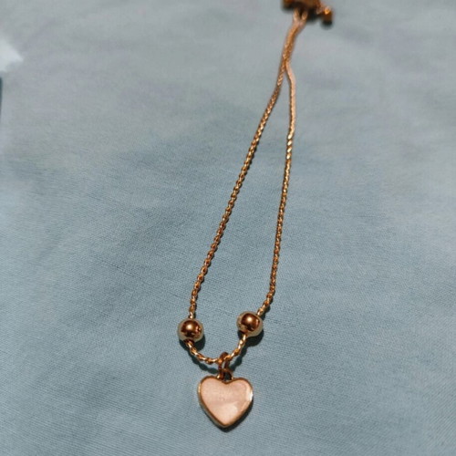Titanium steel bracelet with heart gold plated new, white and gold